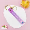 Llavero Colgante de Cordón de Cuero con Letra Transparente Brillante con Accesorios Estilo Muñeca Rellena de Aceite Encanto de Llavero Pulsera Venta al por Mayor