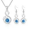 Nuevo producto de transmisión en vivo transfronteriza: Aretes largos con circonia de colores, aretes de cisne pequeños para mujer, conjunto versátil de dos piezas de collar y colgante