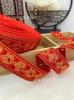 En Stock 2.0-5.0cm Rojo Brillante Accesorios Festivos para el Cabello, Diademas con Cintas de Bordado Jacquard Estilo Étnico Al por Mayor