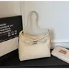 Bolso Versátil de Nicho para Mujer 2025 Nuevo Modelo Textura de Alta Calidad Bolso de Hombro Cruzado Súper Popular Bolso Tote de Gran Capacidad para el Trabajo