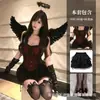 Sin error, este es un conjunto de lencería sexy que presenta un body, una falda abullonada y un atuendo de encaje, perfecto para Halloween.