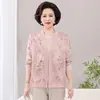 Ropa para madre 2026 otoño conjunto de dos piezas de cárdigan de punto para mujeres de mediana edad y mayores, conjunto casual holgado estampado superior