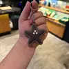 Llavero Creativo de Piel Sintética con Forma de Estrella Colgante para Bolso Regalo Exquisito para Parejas Llavero de Coche Venta al por Mayor