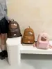 Otoño 2026 Estilo Japonés Hello Kitty Peluche Parche Mochila de Doble Hombro Tierna Linda Estudiante Mochila Gran Capacidad Versátil