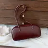 Bolso de mano retro simple para mujer, nuevo bolso casual tipo almohada primavera 2026, bolso de hombro y axila para el día a día