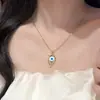 Collar con colgante de ojo de diablo personalizado transfronterizo europeo y americano con diamantes microincrustados, cadena de clavícula de nicho de alta gama para mujer