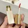 CACE tubo pequeño dorado labial mate barro suave niebla sedosa baja saturación color café con leche versátil blanco natural brillo de labios para estudiante