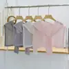 Chal de punto fino de seda helada calado estilo nuevo 2026 para combinar con camisas y faldas, se puede usar sobre una camiseta o como un chaleco pequeño para mujeres en verano