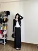 Falda midi negra traje de falda de otoño para mujer atuendo intelectual ligeramente maduro un conjunto completo estilo coreano falda larga intelectual Berkeley