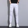 Calça Jeans de Algodão Branca, Estilo Fino de Outono, Corte Slim, Marca de Moda Coreana Masculina 2026, Elástica, Emagrecedora, Calça Rasgada