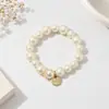 Nuevo Estilo Cadena de Perlas Luna Blanca Goma para el Cabello para Mujeres, Diadema de Gama Alta, Cuerda para el Cabello Elegante y con Estilo