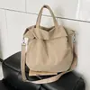 Bolsa de Mão de Nylon Casual de Grande Capacidade para Mulheres 2026 Nova Bolsa Tote Simples Cor Sólida Moda Versátil Bolsa Transversal