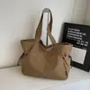 Bolso tote simple de marca moderna para mujer, diseño de nicho, estilo Harajuku, textura, bolso de hombro para el trabajo, bolso de mano color Maillard