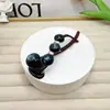 Pinza para el pelo retorcida de perlas con forma de flor para mujer, estilo de alta gama, nuevo modelo 2025, pinza para moño informal para la parte trasera de la cabeza, pasador