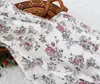 Algodón artificial estampado de dibujos animados, tela de algodón, tela de algodón floral, vestidos de verano, ropa de muñeca, pantalones, tela de algodón y seda