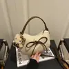 Bolsos de diseñador únicos para mujer 2026 nuevo otoño versátil bolso cruzado bolso de mano moderno bolso de mano pequeño diario