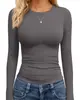 Camiseta informal de manga larga ajustada de color liso con estampado y cuello redondo para mujer, popular en Europa y América, de la marca Amazon TK, para exportación transfronteriza