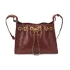 Bolsa Pequena de Axila Retro de Nicho para Mulheres 2026 Novo Estilo Bolsa de Balde Acolchoada com Corrente Bolsa de Ombro Transversal Texturizada de Inverno