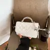 Bolsa de Ombro Feminina Nova Moda 2026 Corrente com Padrão de Diamante Transfronteiriça Estilo Chanel, Bolsa Quadrada Pequena Transversal com Laço Versão Coreana
