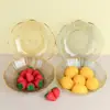 Plato de frutas para el hogar alta calidad material PET plástico alta apariencia borde dorado forma de flor plato de frutas para sala de estar plato de nueces venta al por mayor