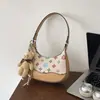 Bolsa de Ombro Nova de Luxo Leve Outono 2026 Bolsa de Ombro Transversal da Moda Grande Capacidade Bolsa de Mão Feminina de PU para o Dia a Dia