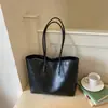 Bolso tote de gran capacidad estilo coreano, nuevo modelo de verano 2026, bolso de hombro simple casual de color liso para el trabajo y los desplazamientos, moderno