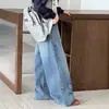 Pantalones vaqueros anchos estilo coreano de dibujos animados para niñas, nuevos y modernos jeans infantiles de otoño 2026