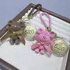Popular Llavero Colgante Pastel de la Fortuna Princesa Dorada Colgante de Lista Dorada Bolso Regalo de Paz y Alegría