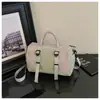 Nueva bolsa de viaje de moda de comercio exterior, gran capacidad, diseño moderno y minimalista, adecuada para viajes cortos, viajes de negocios y uso en el gimnasio, se puede llevar en la mano o usar como bolsa cruzada