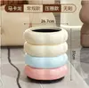 Papelera con forma de dona para uso doméstico, Nueva de alto valor, moderna, para sala de estar, lujo ligero, móvil, para cocina, papelera de alta gama con tapa