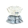 Conjunto de manga corta para niña, nuevo estilo verano 2026, falda pastel de verano estilo coreano, conjunto de dos piezas de moda, venta al por mayor