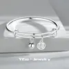 Pulsera de la Fortuna para Mujer con Carácter de Bendición y Colgante de Cascabel, Nuevo Diseño Nicho Estilo Chino, Pulsera Versátil de Empuje y Tirón Chapada en Plata