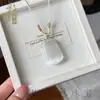 Colgante de Piedra Ojo de Gato con Cierre de Paz para Mujer, Collar de Calcedonia con Cierre Ruyi Multicolor, Nuevos Accesorios de Estilo Chino Nacional, Suministro Mayorista para Transmisión en Vivo