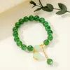 [Venta al por mayor directa de fábrica] Nuevo estilo chino Imitación Jade Dongling Puesto de Exhibición de Feria de Templo del Mercado Nocturno Pulsera de Vidrio Joyería Más Vendido