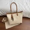 Bolso tote tejido vintage para mujer, nuevo modelo otoño 2026, bolso de hombro casual de gran capacidad, bolso de axila de alta gama y elegante