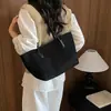 Bolso de mano retro de moda transfronterizo, bolso de hombro grande de moda, nuevo bolso casual con textura para mujer 2026