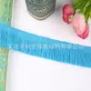 Venta al por mayor del fabricante Yiwu Trading presenta nuevos accesorios de encaje con flecos, accesorios para la ropa y encaje de borlas coloridas para cortinas
