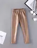 Ropa nueva de otoño e invierno para niños, pantalones de imitación de cuero para bebé niña, pantalones infantiles de color con forro polar, fabricantes de suministro de espejo cruzado