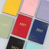 Planejador inglês 2027 transfronteiriço, calendário espanhol, caderno planejador de trabalho com visual elegante, personalizável