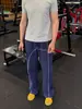 Pantalones de chándal azul oscuro estilo americano de marca de moda línea Hasselblad con dobladillo curvo fluido, diseño relajado, pantalones casuales de pierna ancha estilo ins