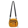 Bolsa de Lona para Mulheres Verão 2025 Nova Estilo Esportivo Outdoor de Viagem Bolsa Transversal para Homens Pequena Bolsa Versátil de Alta Qualidade Estilo Coreano