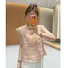 Nueva camisa sin mangas de estilo chino con cuello mao y botones para mujer, nuevo diseño 2026 con ribete de encaje, top elegante y favorecedor