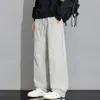 Calças funcionais impermeáveis para caminhada ao ar livre masculinas, estilo casual americano, corte solto, tamanhos grandes, versátil, calças de trabalho de perna reta