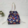 Suministro directo de fábrica bolsa portátil con cordón bolsa de lona portátil monedero para teléfono móvil bolsa pequeña de dibujos animados para mujer bolsa para la compra de mamá