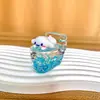 Botella de arena movediza creativa DIY Campana de viento aceite luminoso flotante llavero bolsa Colgante de coche pequeño regalo fabricante