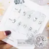 Paquete de material para manicura 2024 primavera y verano nuevo estilo mono mismo estilo hacha Corazón Torcido Cristal K9 diamante flash manicura al por mayor