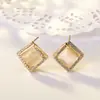 Brincos de alta qualidade estilo coreano com microincrustação brincos femininos retrô com pedra olho de gato brincos de menina delicados quadrados brincos de temperamento