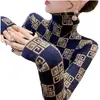 Tejido de punto de cuello alto de moda Camiseta básica de mujer Primavera 2025 Nuevo Tejido de punto ajustado Ropa interior de mujer