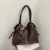 Bolsa de mão de cor sólida para mulheres, estilo coreano, chique sem esforço, coleção de outono 2026, bolsa de ombro, bolsa tote com design estiloso