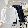 Camisa de Manga Larga de Algodón Lavado para Niños Primavera y Otoño 2026 Camisa de Color Sólido con Cuello de Bolsillo Estilo Coreano para Niños Mayores y Niños Pequeños